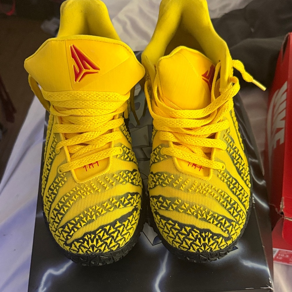 Nike Kids Yellow Sneakers with Red Logo Accent